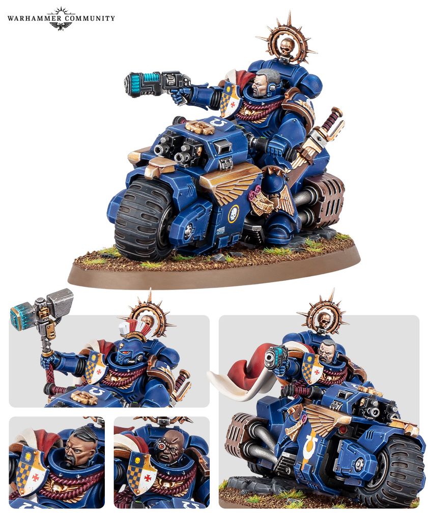 Blue armored Space Marine riding a detailed blue and gold warbike aiming a gun on a grassy base