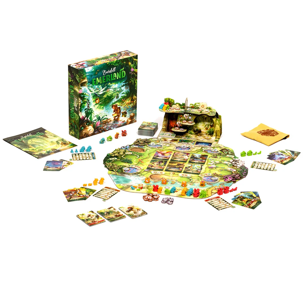 Colorful fantasy board game set with a round board cards tokens and a jungle themed box labeled Emerland on a white background Emerland reviewEmerland review