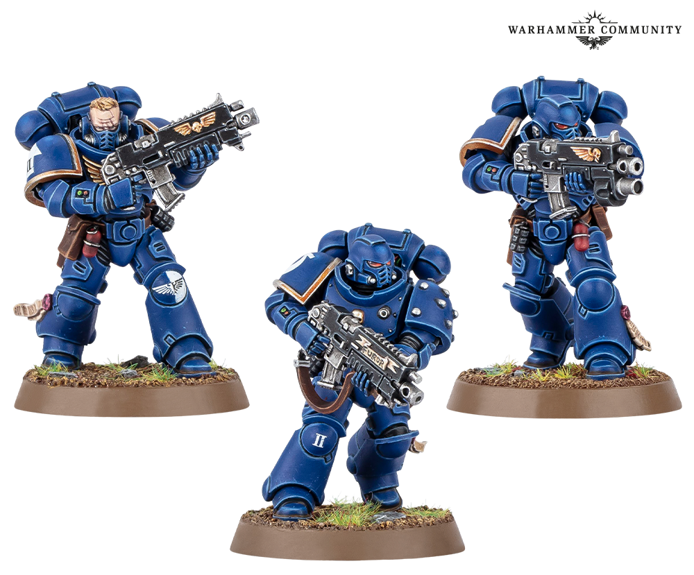 image Frontline Gaming Three blue Space Marines miniatures in dynamic firing poses on round bases with textured terrain each armed with detailed boltguns