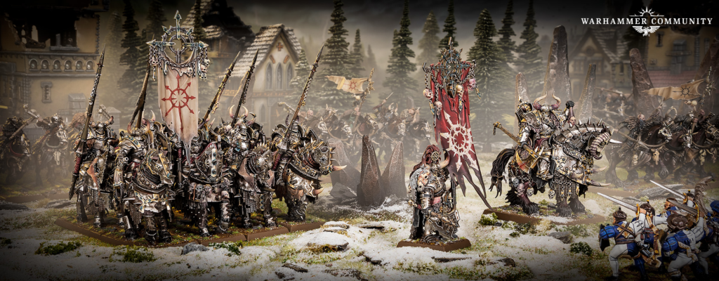 Warhammer tabletop battle diorama with armored troops and banners on a snowy battlefield Warhammer Community logo in the top right corner