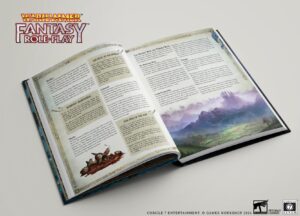 Open rulebook spread with two pages of text and a scenic landscape illustration on the right Warhammer Fantasy Roleplay logo top left