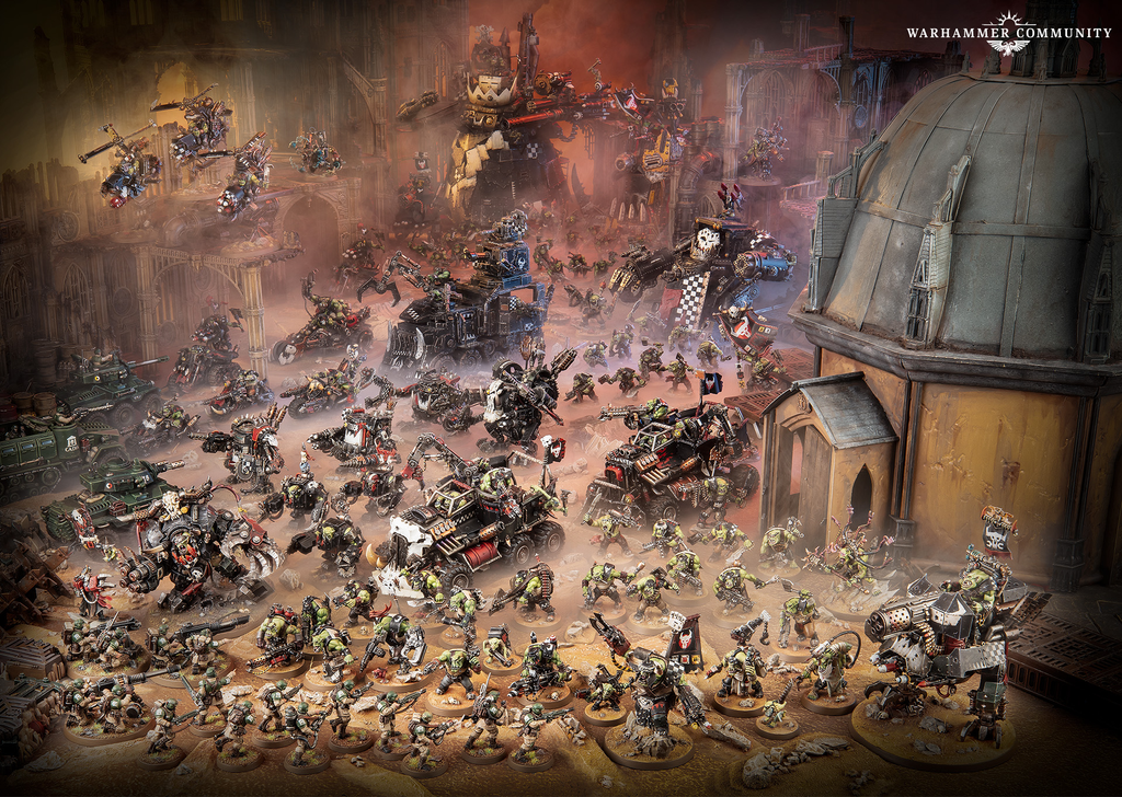 Warhammer 40k battle scene with thousands of orcs and war machines clashing in a ruined Gothic city smoke filling the air