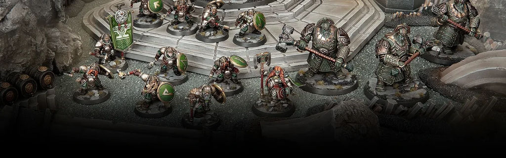 image Frontline Gaming Group of painted fantasy miniatures in armor on a stone battlefield ready for battle in a tabletop wargame