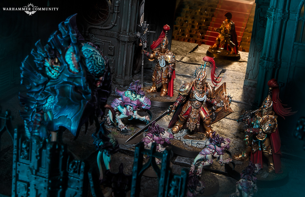 Tabletop Warhammer battle scene with ornately armored figures in a dungeon like setting under blue green lighting Central gold armored warrior with red cape faces a dragon like foe