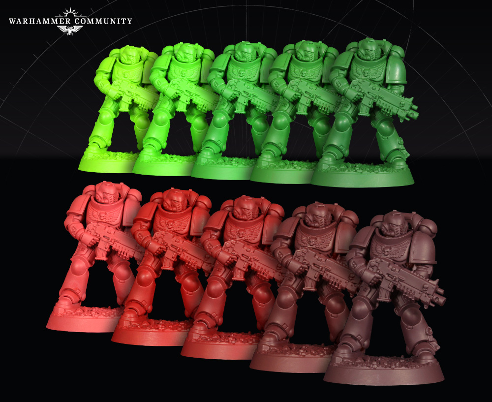 image Frontline Gaming Row of Warhammer Space Marines miniatures in green red and brown hues set against a black background with the Warhammer Community logo visible at top left