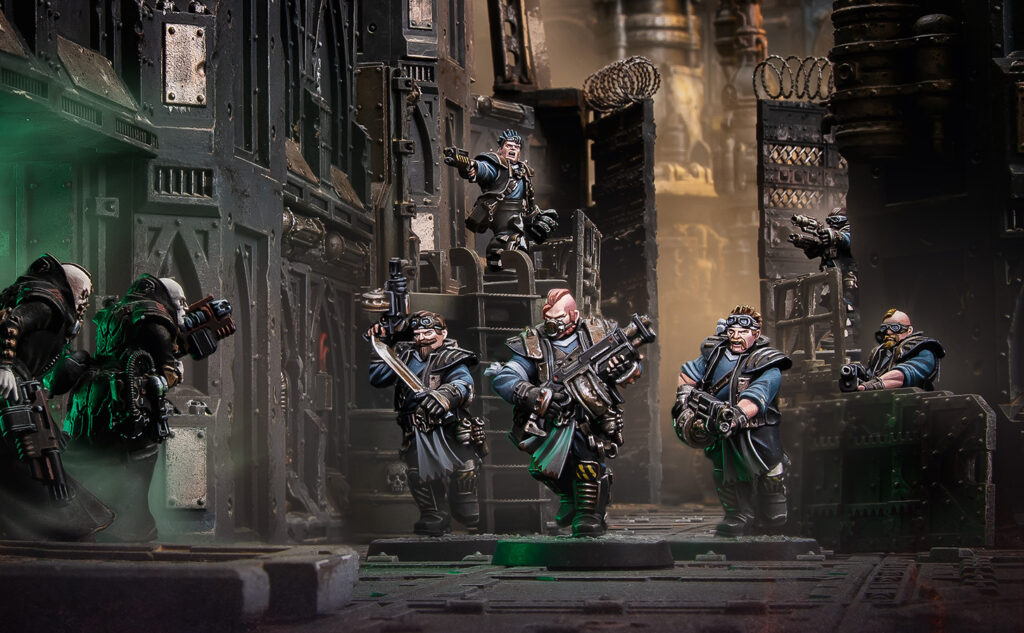 necorlocktacoct271featurentl3jhn7hx Frontline Gaming Group of armored sci fi marines advance through a gritty industrial fortress guns ready and a green glow on the left